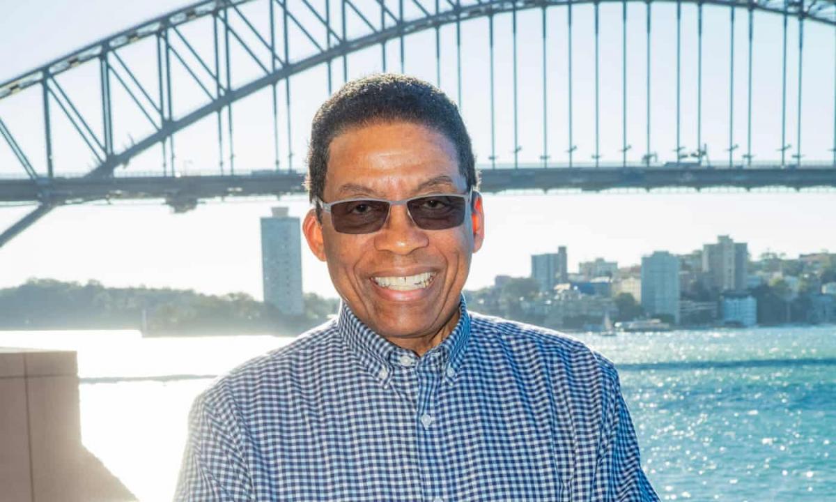 Herbie Hancock poses for a photo in front of the Sydney Harbour Bridge